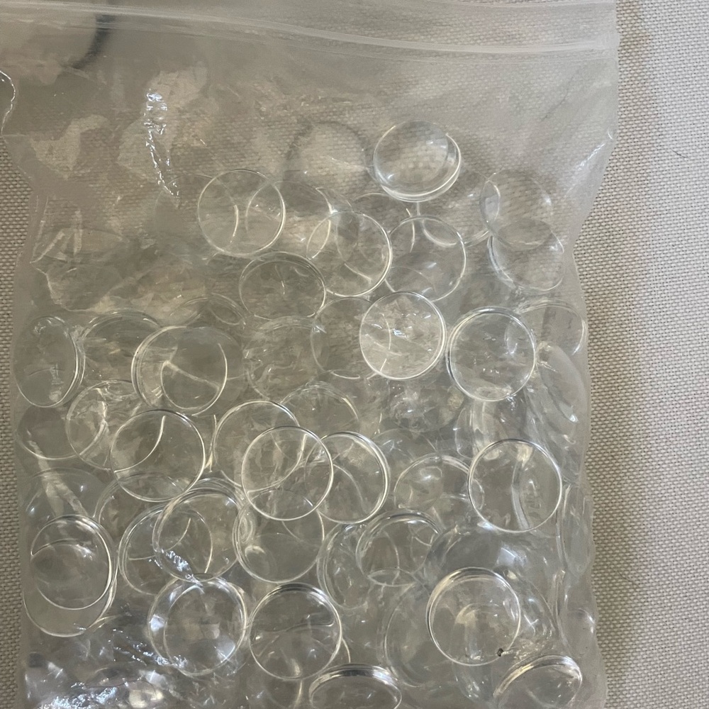 75+pieces of 1-inch glass dome cabochons